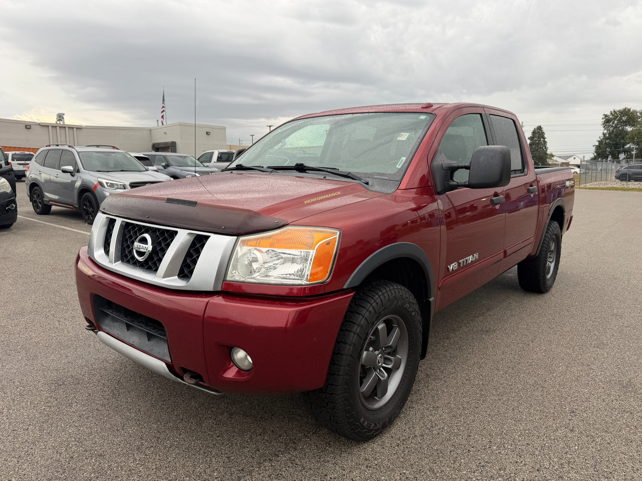 Cayenne Red 2015 Nissan Titan Pickup Truck Four-Wheel Drive 5-Speed Automatic