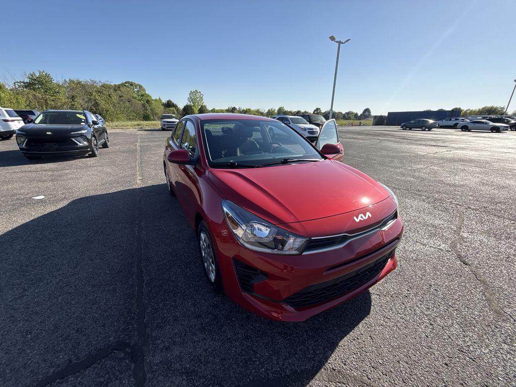 Currant Red 2023 Kia Rio S FWD Sedan Front-Wheel Drive Continuously Variable Transmission