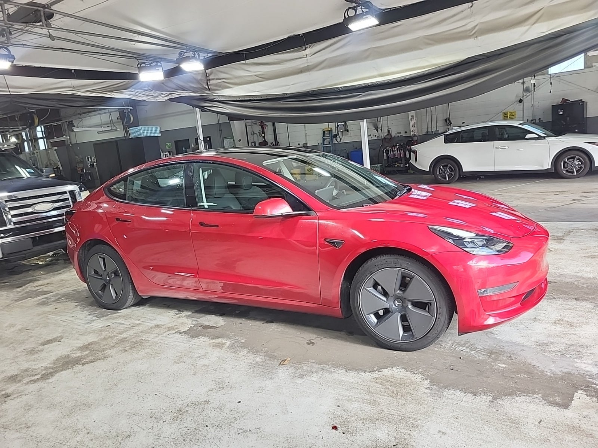 Red 2023 Tesla Model 3 Sedan Rear-Wheel Drive Automatic