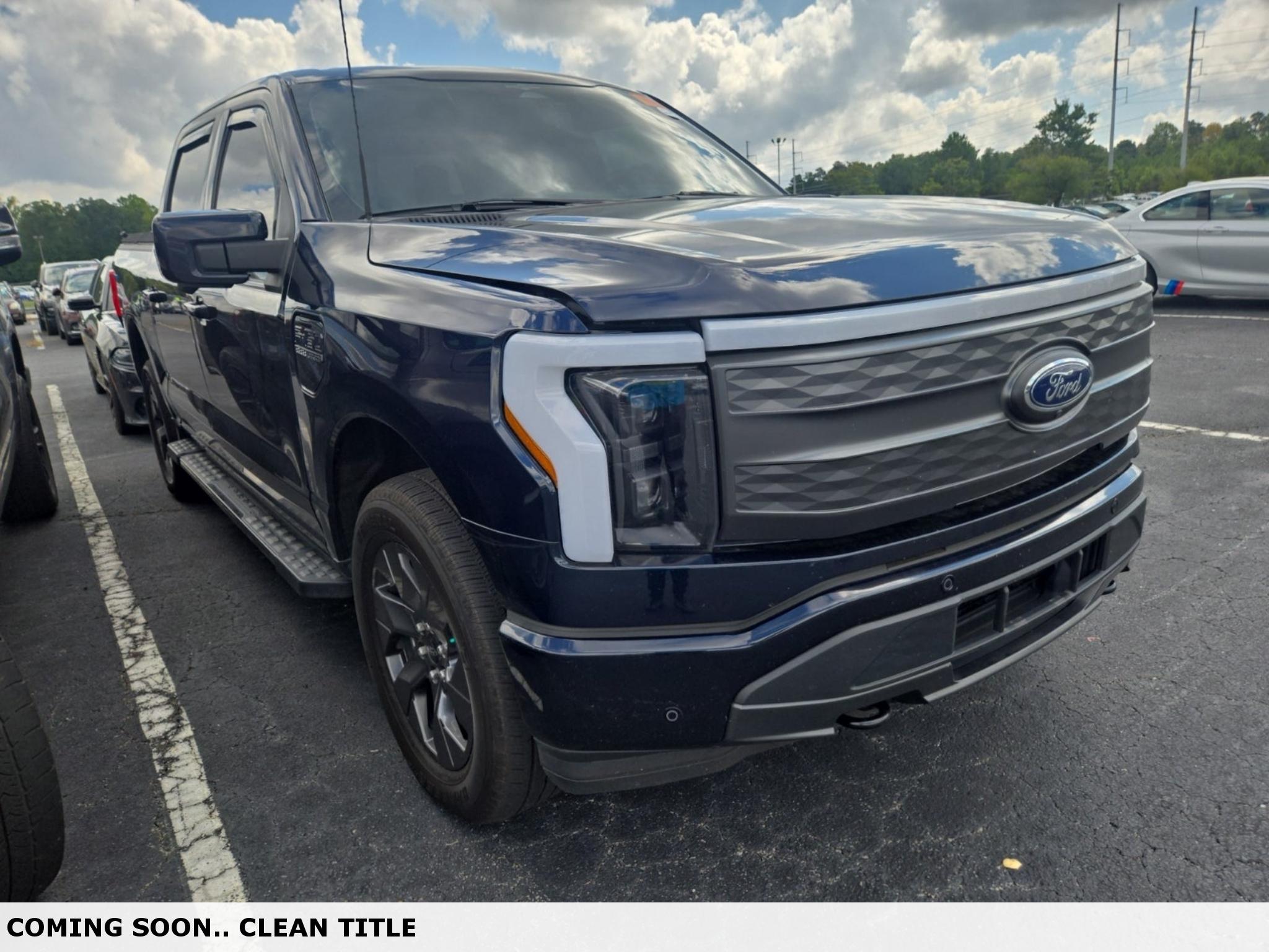 Blue 2023 Ford F-150 Lightning Pickup Truck All-Wheel Drive Automatic