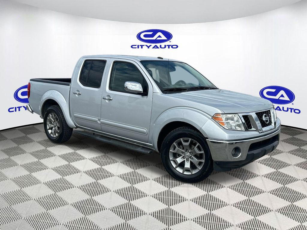 Brilliant Silver Metallic 2019 Nissan Frontier SL Crew Cab RWD Pickup Truck 4X2 5-Speed Automatic