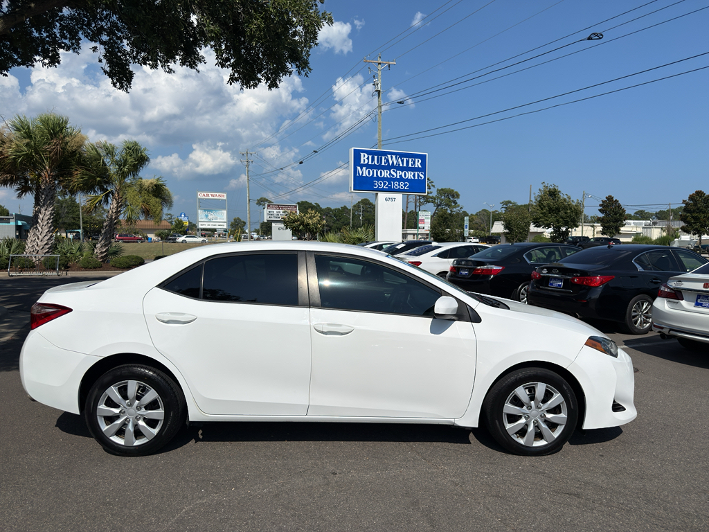 Super White 2019 Toyota Corolla Sedan Front-Wheel Drive Continuously Variable Transmission