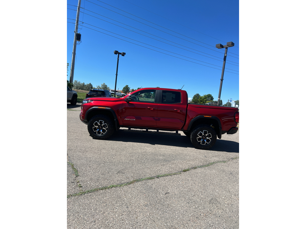 Volcanic Red Tintcoat 2024 GMC Canyon Pickup Truck Four-Wheel Drive 8-Speed Automatic