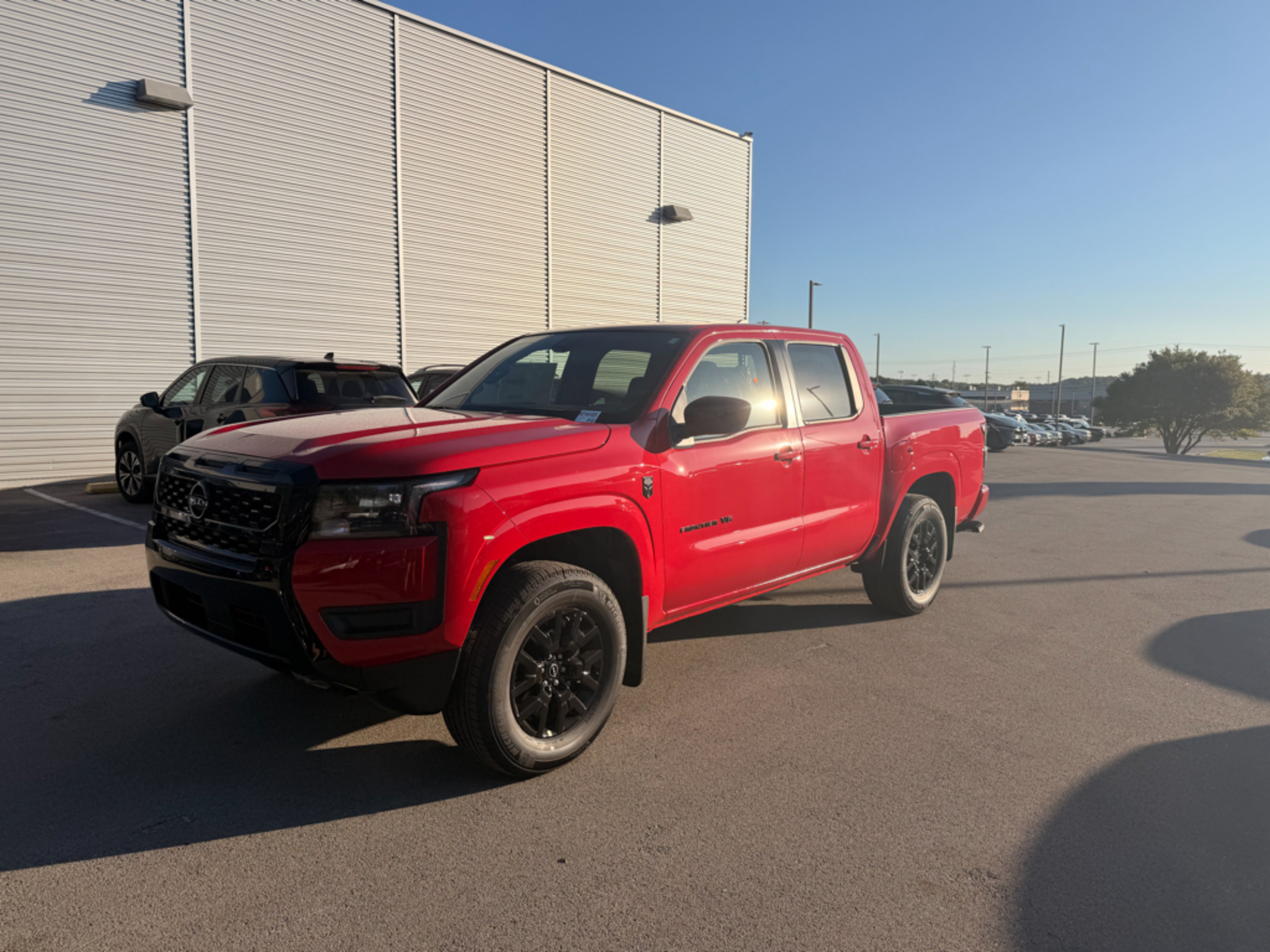 2027 Nissan Frontier SV in RED ALERT