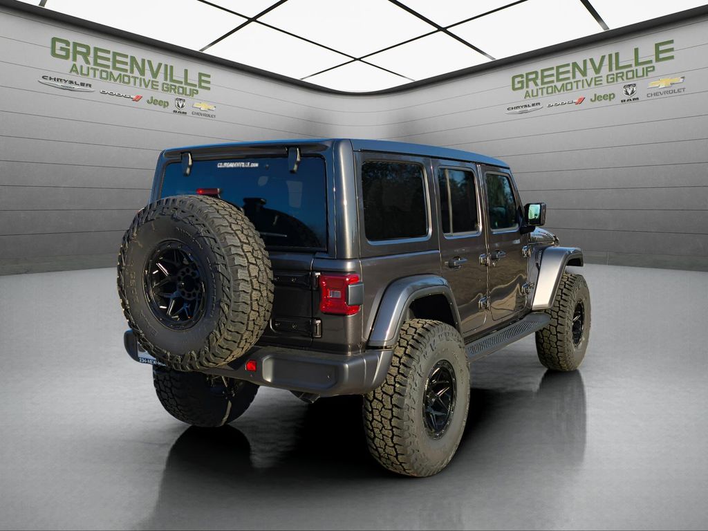 2025 Jeep Wrangler Sahara - Granite Crystal Metallic Clearcoat exterior view 9