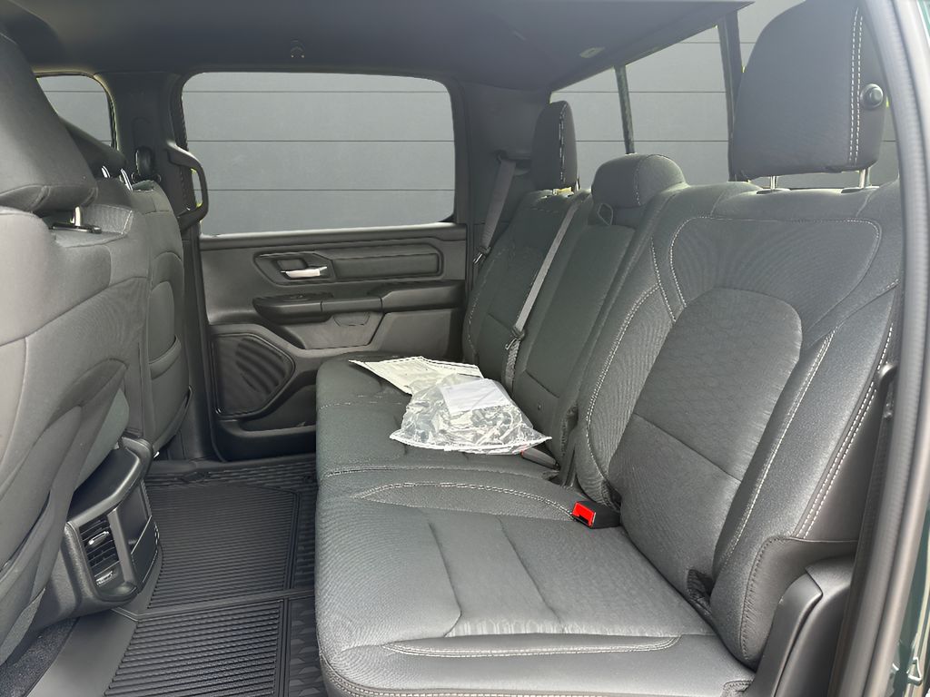 2026 Ram 1500 Warlock Hemi 4x4 Crew Cab - Serrano Green Metallic exterior view 18