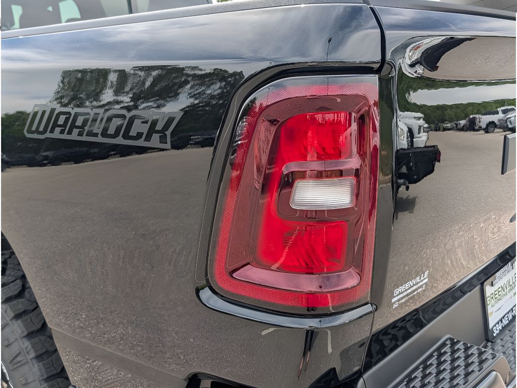 2026 Ram 1500 Warlock Hemi 4x4 Crew Cab - Diamond Black Crystal Pearlcoat exterior view 4