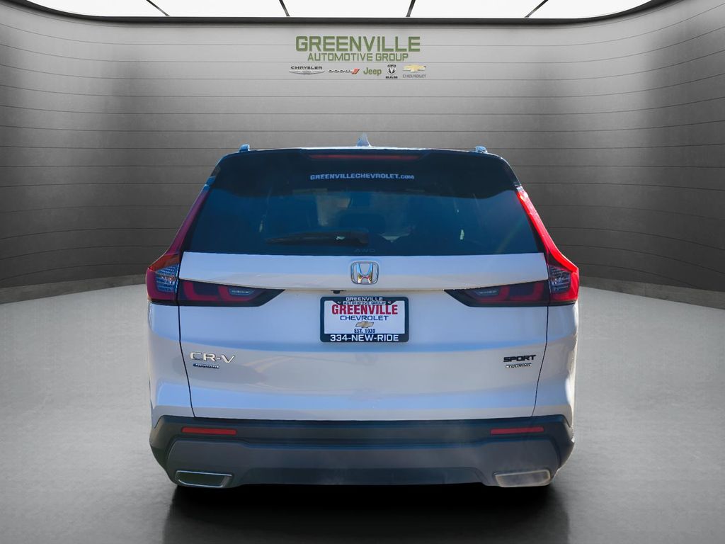 2025 Honda CR-V Hybrid Sport Touring - White exterior view 6