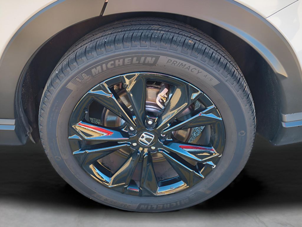 2025 Honda CR-V Hybrid Sport Touring - White exterior view 3