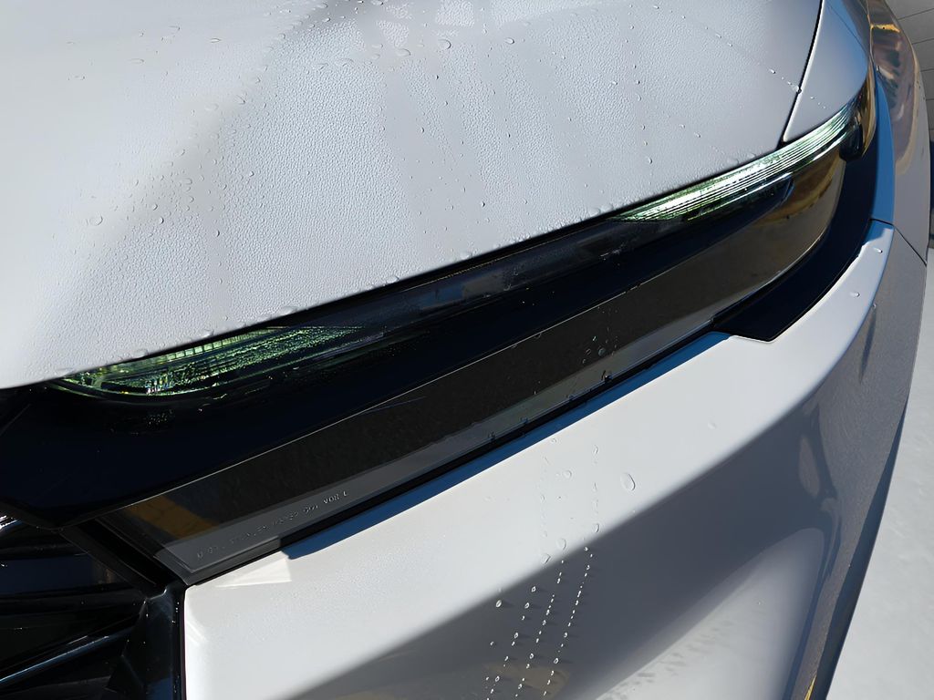 2025 Honda CR-V Hybrid Sport Touring - White exterior view 12