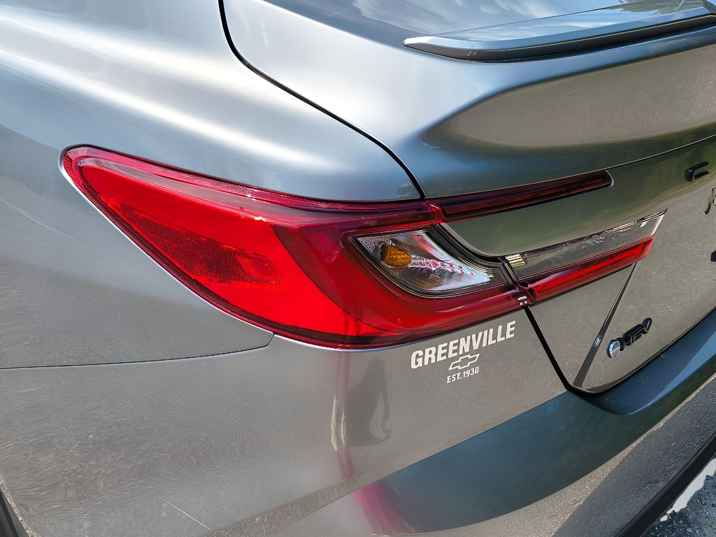 2025 Toyota Camry Hybrid SE - Heavy Metal exterior view 4