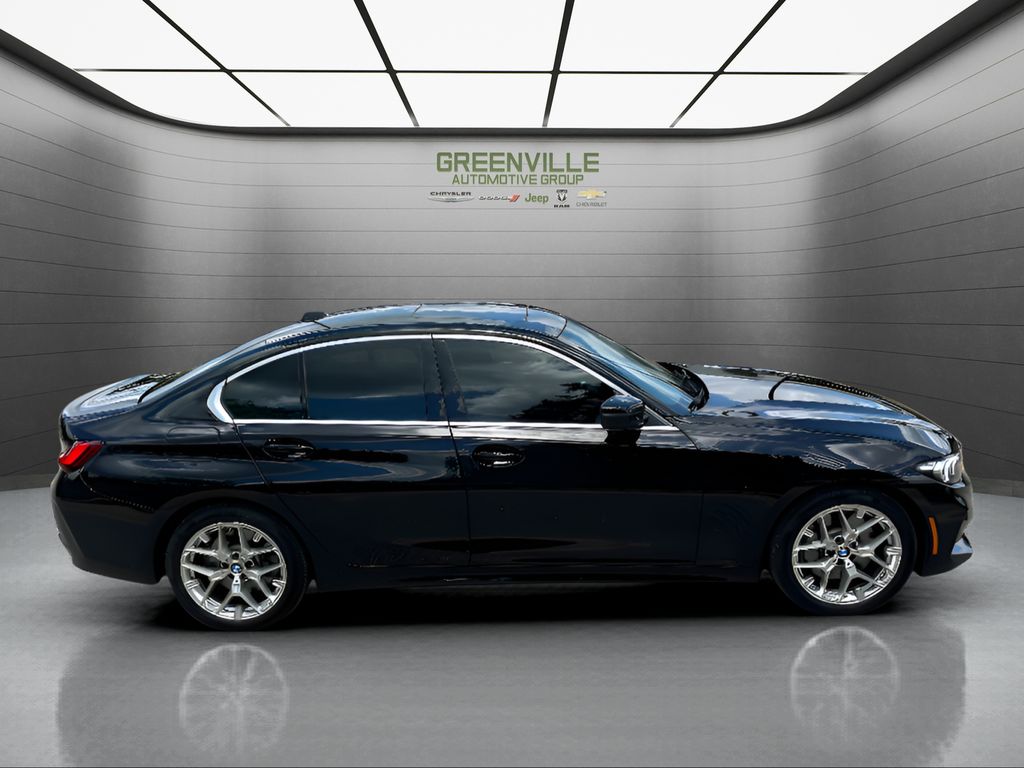 2025 BMW 3 series 330i - Black exterior view 4