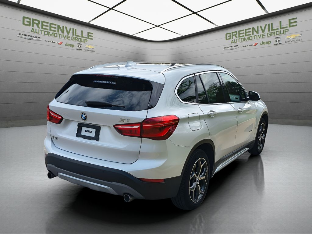 2017 BMW X1 xDrive28i - Mineral White Metallic exterior view 5