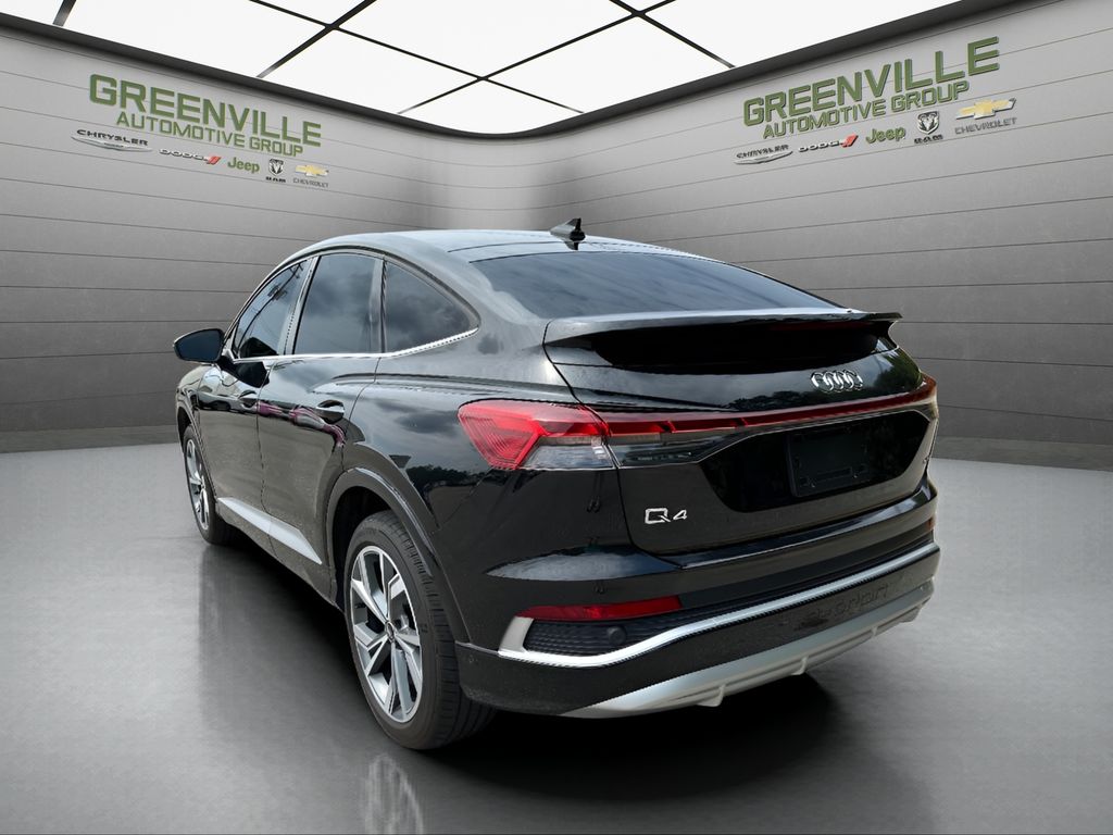 2023 Audi Q4 e-tron Sportback Premium Plus - Mythos Black Metallic exterior view 3