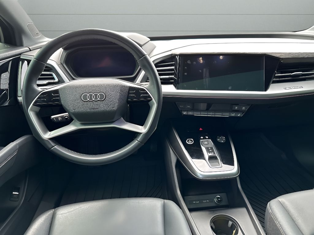 2023 Audi Q4 e-tron Sportback Premium Plus - Mythos Black Metallic exterior view 9