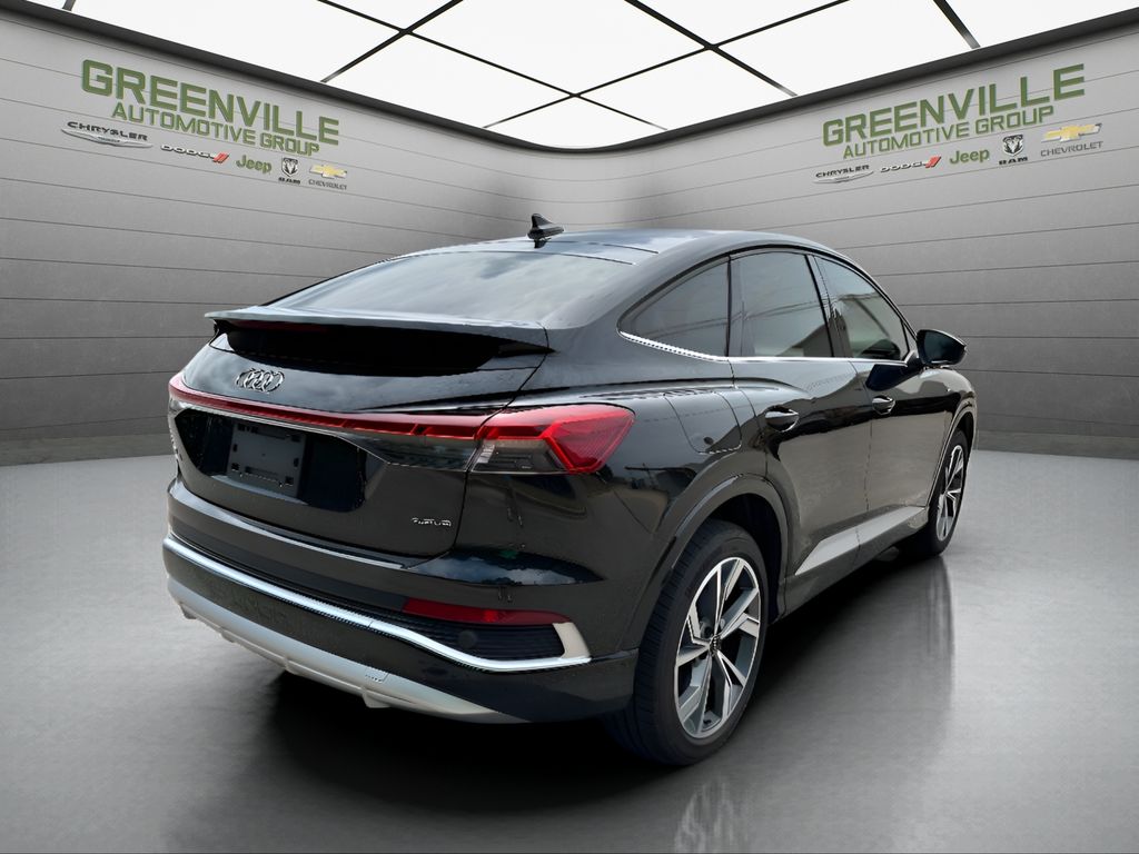 2023 Audi Q4 e-tron Sportback Premium Plus - Mythos Black Metallic exterior view 5