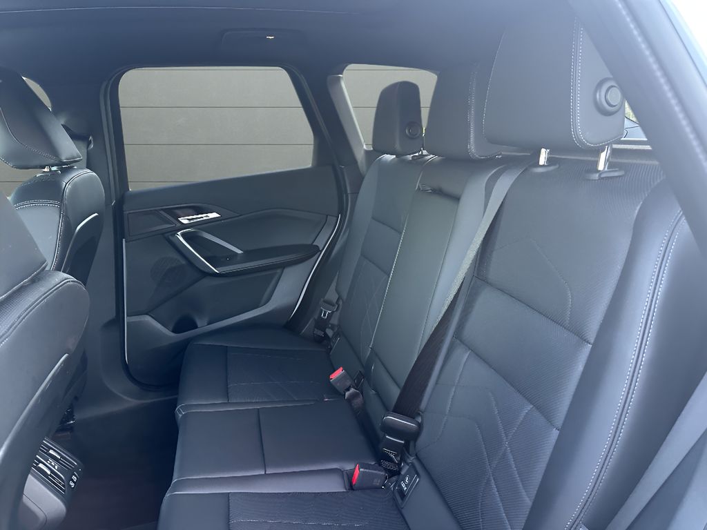 2025 BMW X1 xDrive28i - Alpine White exterior view 12