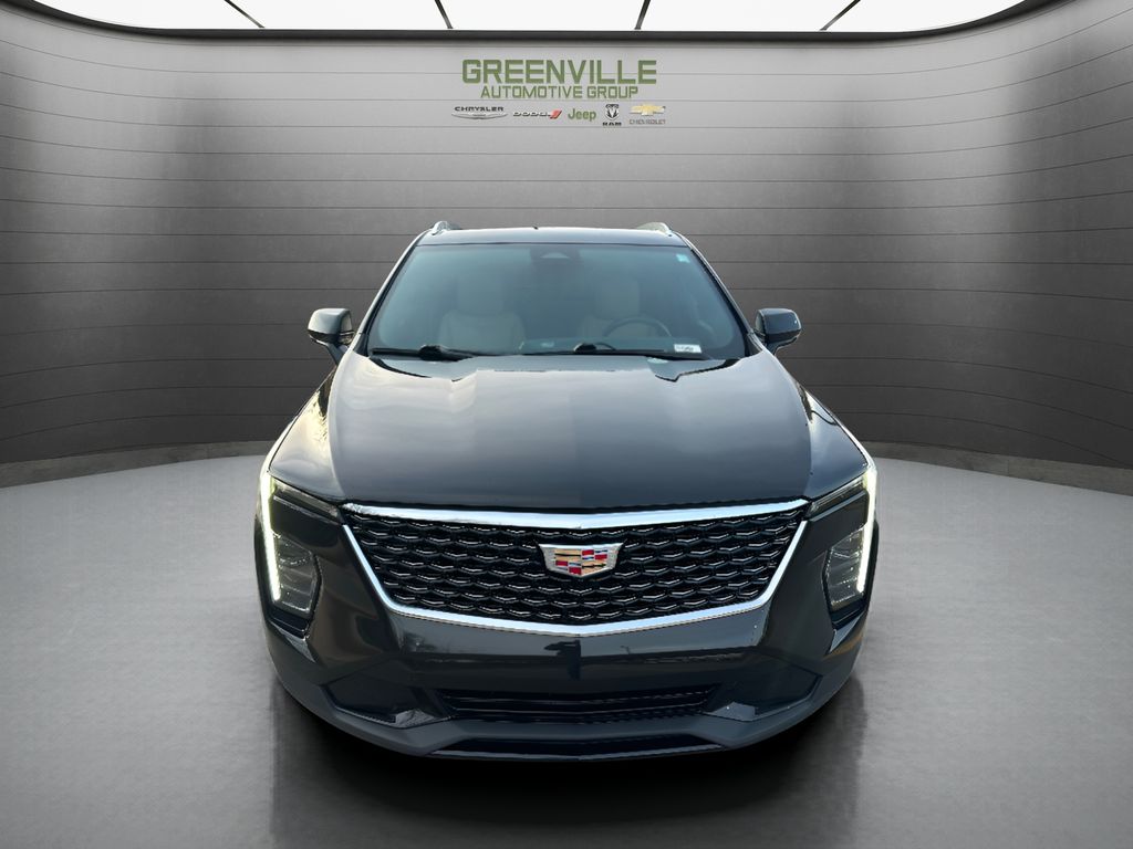 2025 Cadillac XT4 FWD Premium Luxury - Stellar Black Metallic exterior view 2