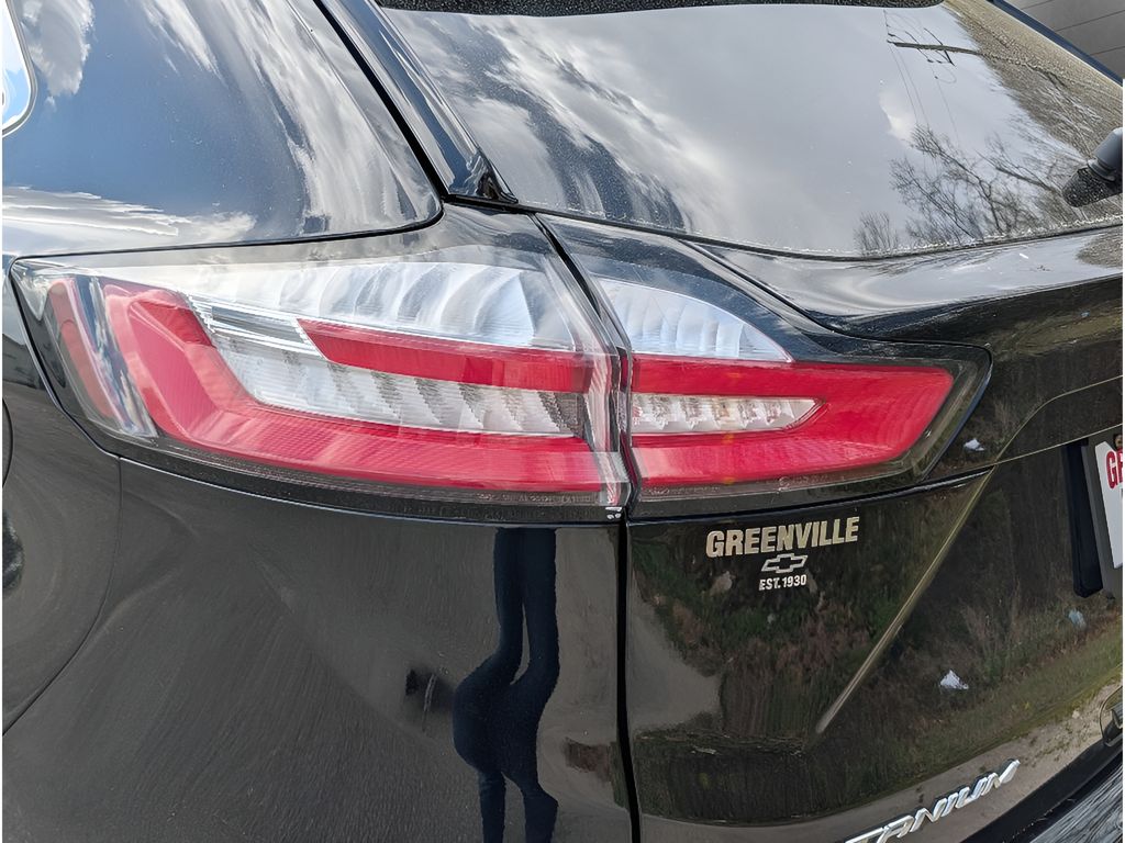 2024 Ford Edge Titanium - Agate Black Metallic exterior view 5