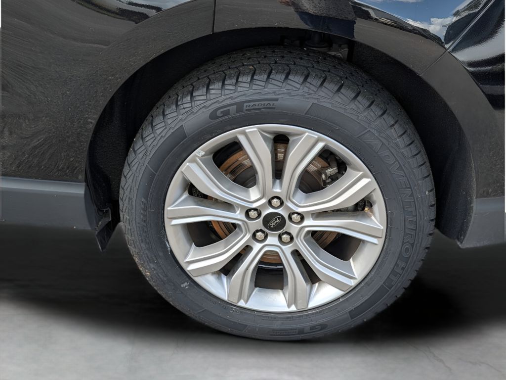 2024 Ford Edge Titanium - Agate Black Metallic exterior view 4