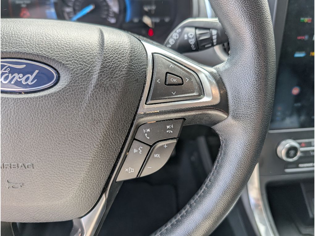 2024 Ford Edge Titanium - Agate Black Metallic exterior view 20