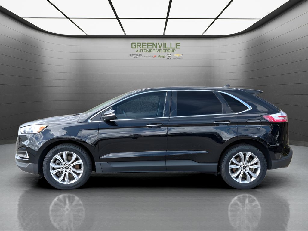 2024 Ford Edge Titanium - Agate Black Metallic exterior view 3