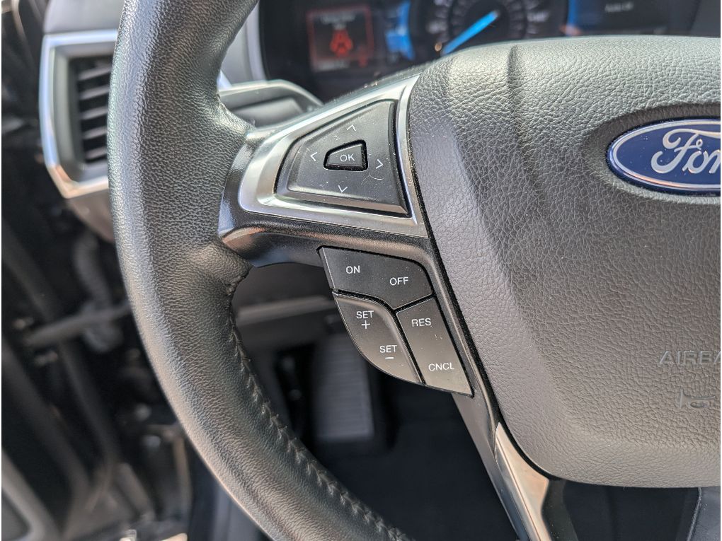 2024 Ford Edge Titanium - Agate Black Metallic exterior view 19