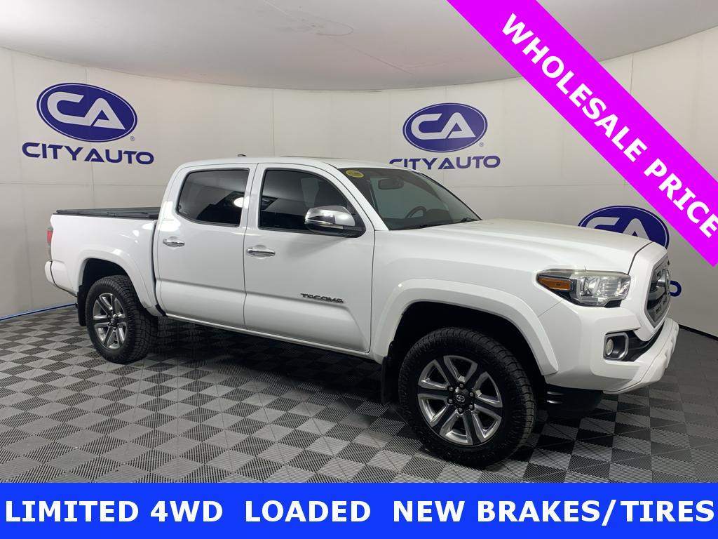 Super White 2016 Toyota Tacoma Pickup Truck Four-Wheel Drive 6-Speed Automatic