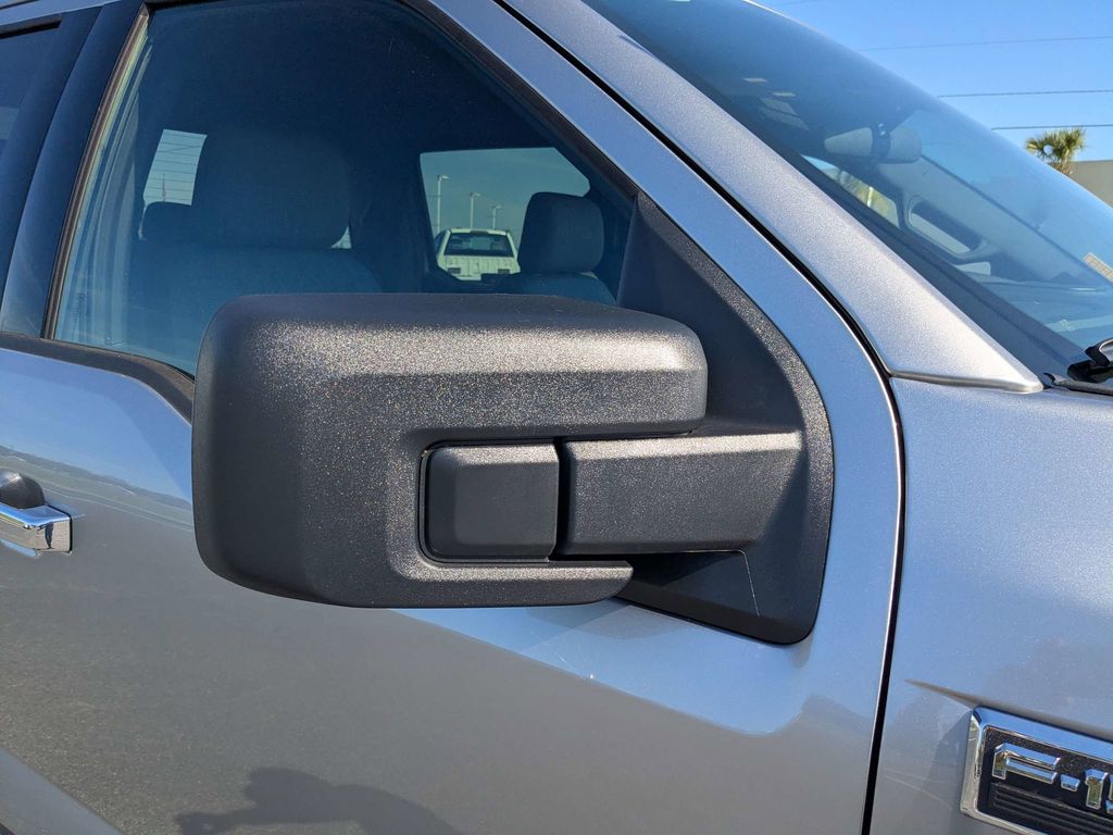 2026 Ford F-150 XLT - Iconic Silver Metallic exterior view 12