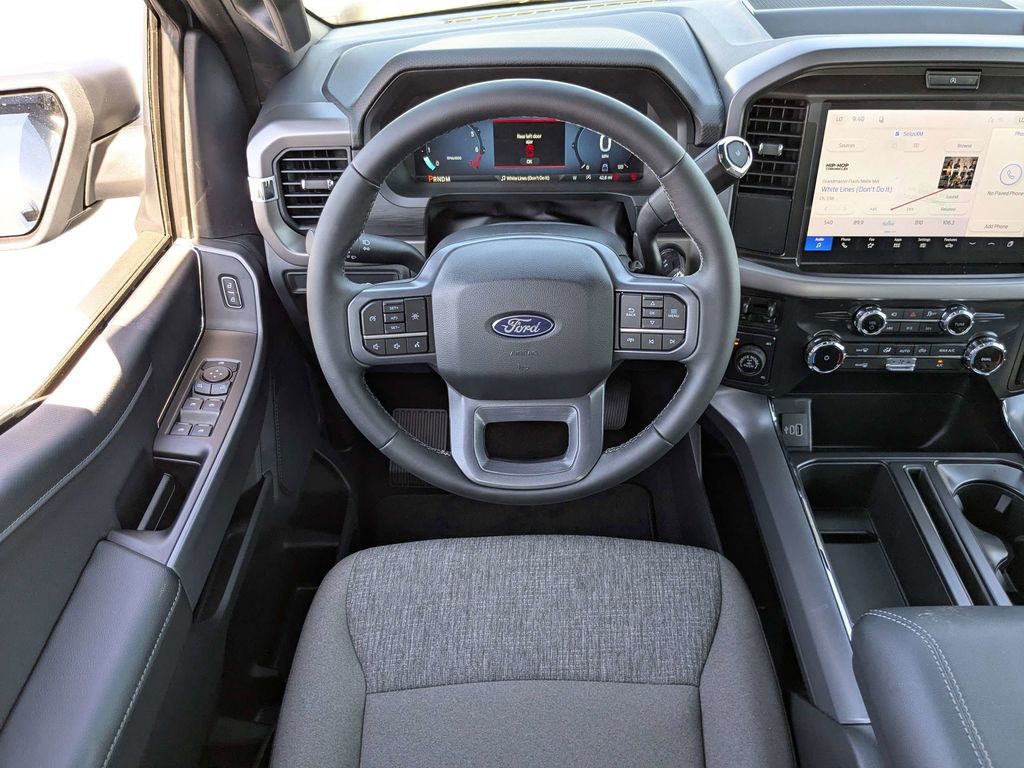 2026 Ford F-150 XLT - Iconic Silver Metallic exterior view 16
