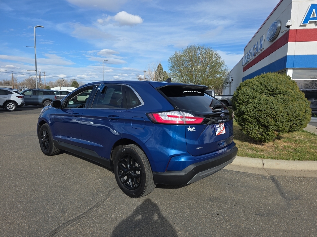2024 Ford Edge SEL - Atlas Blue Metallic exterior view 8