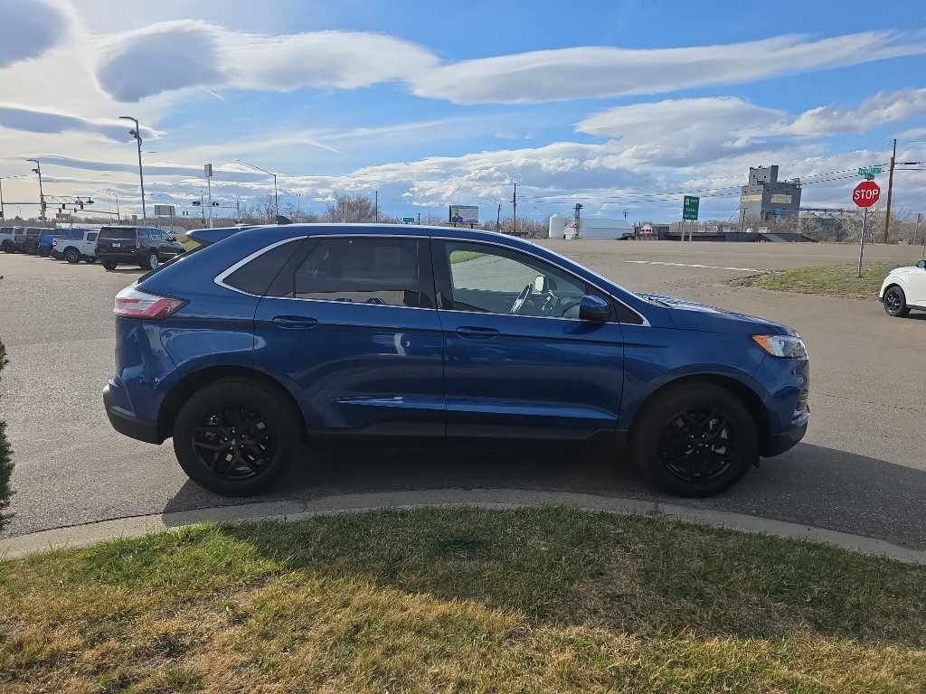 2024 Ford Edge SEL - Atlas Blue Metallic exterior view 4