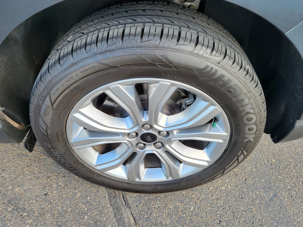 2024 Ford Edge Titanium - Stone Blue Metallic exterior view 9