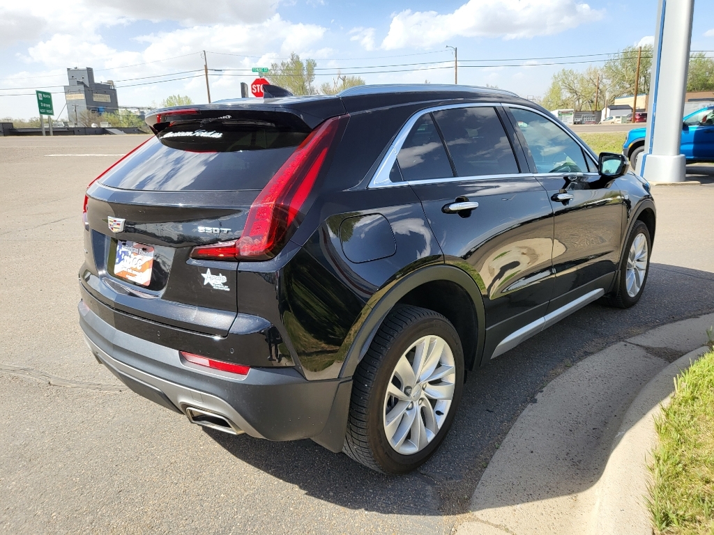 2022 Cadillac XT4 AWD Premium Luxury - Stellar Black Metallic exterior view 4
