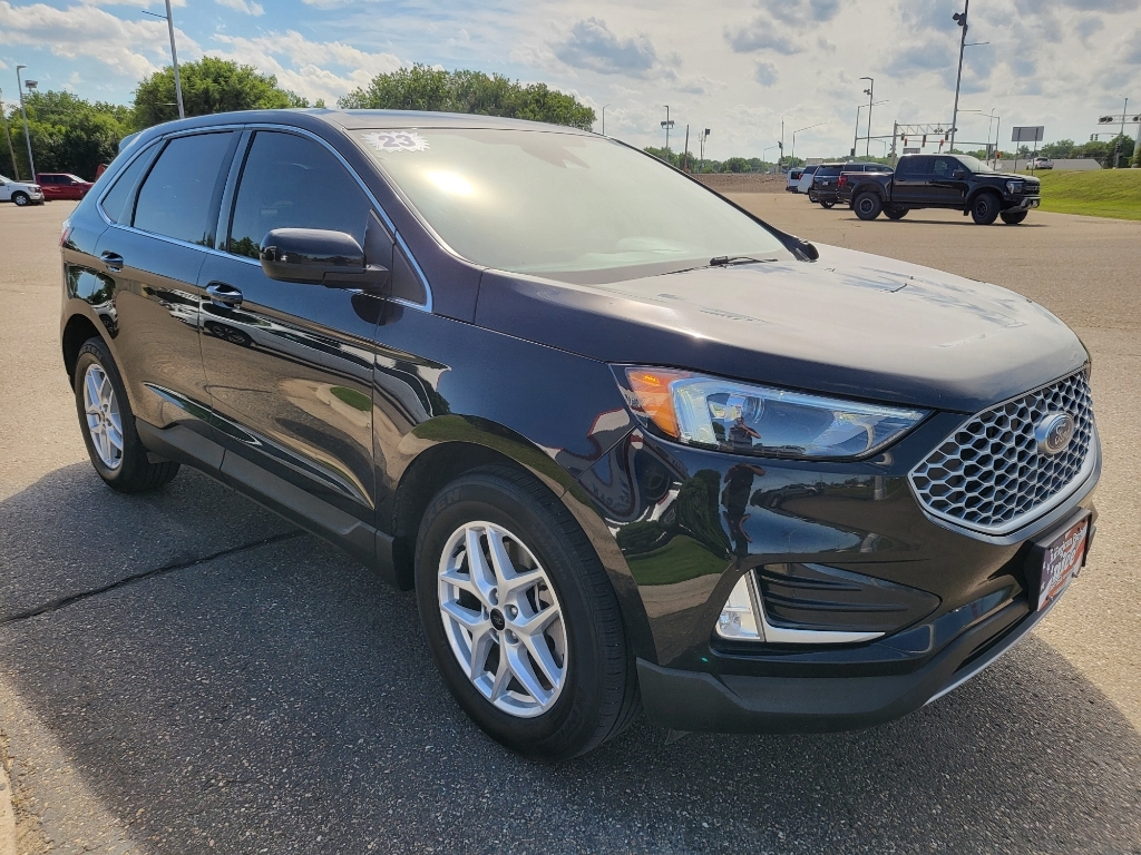 2023 Ford Edge SEL - Agate Black Metallic exterior view 3