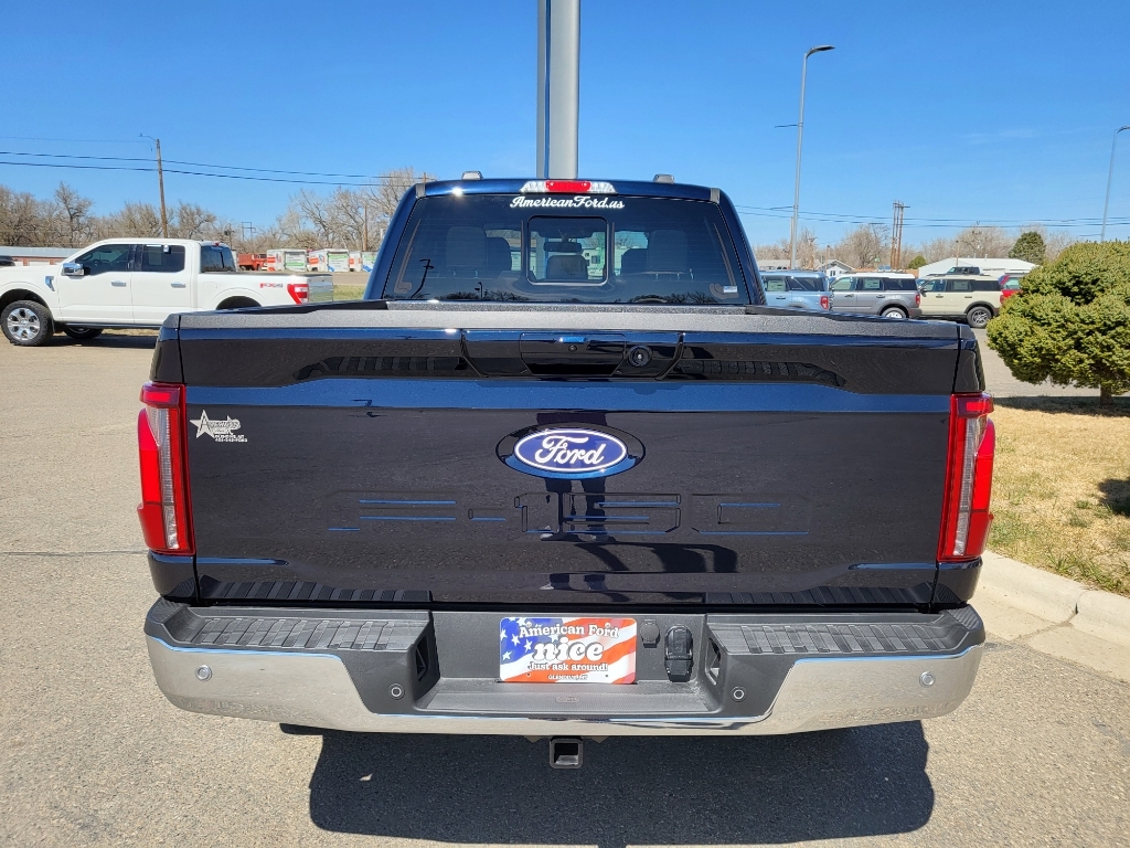 2026 Ford F-150 LARIAT - Antimatter Blue Metallic exterior view 5