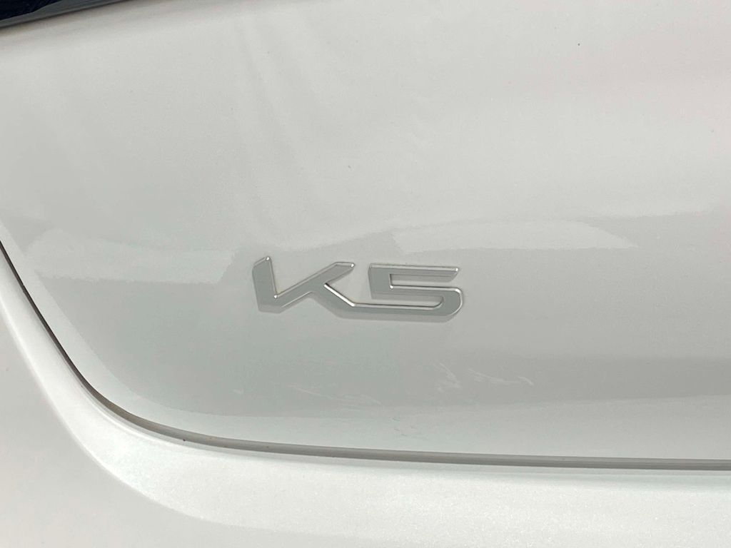 2025 Kia K5 EX - Snow White Pearl exterior view 8