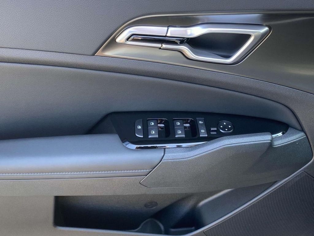 2025 Kia Sportage Hybrid EX - Snow White Pearl exterior view 13