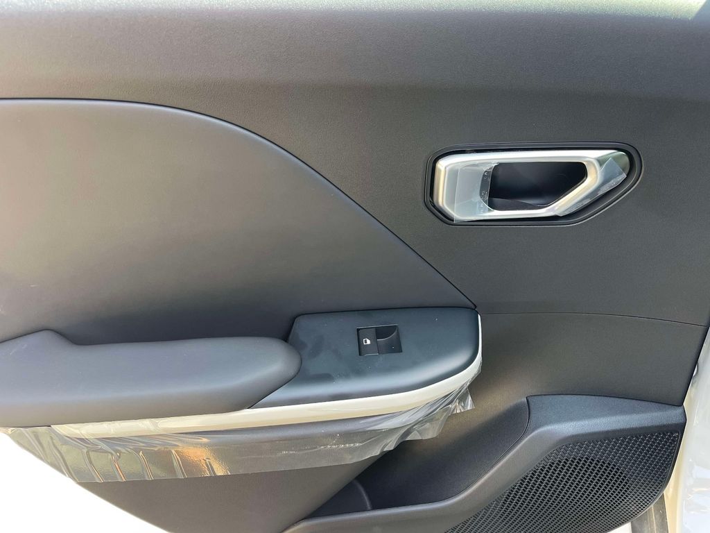 2025 Kia K4 GT-Line Turbo - Snow White Pearl exterior view 12