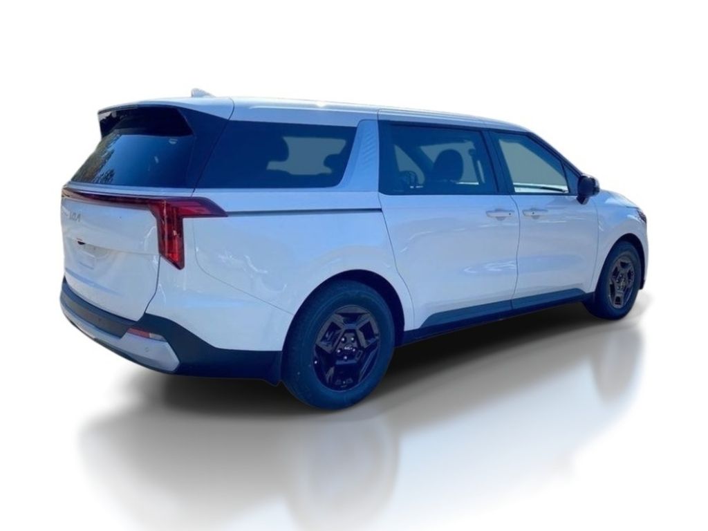 2026 Kia Carnival LXS - Snow White Pearl exterior view 7