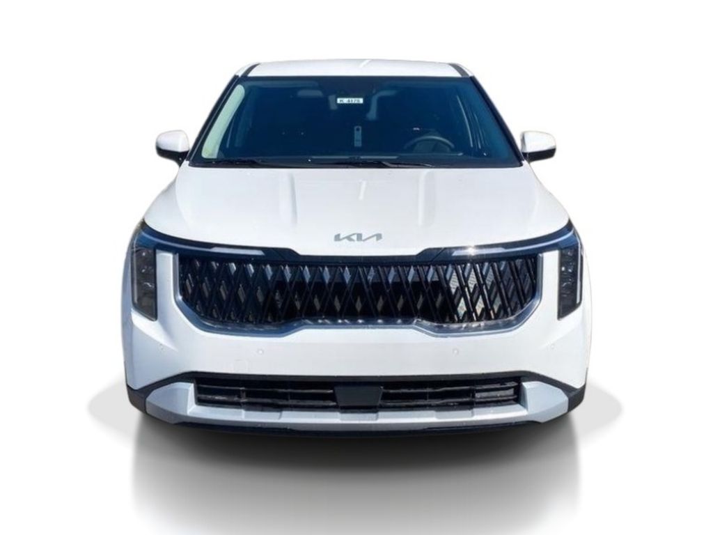 2026 Kia Carnival LXS - Snow White Pearl exterior view 3