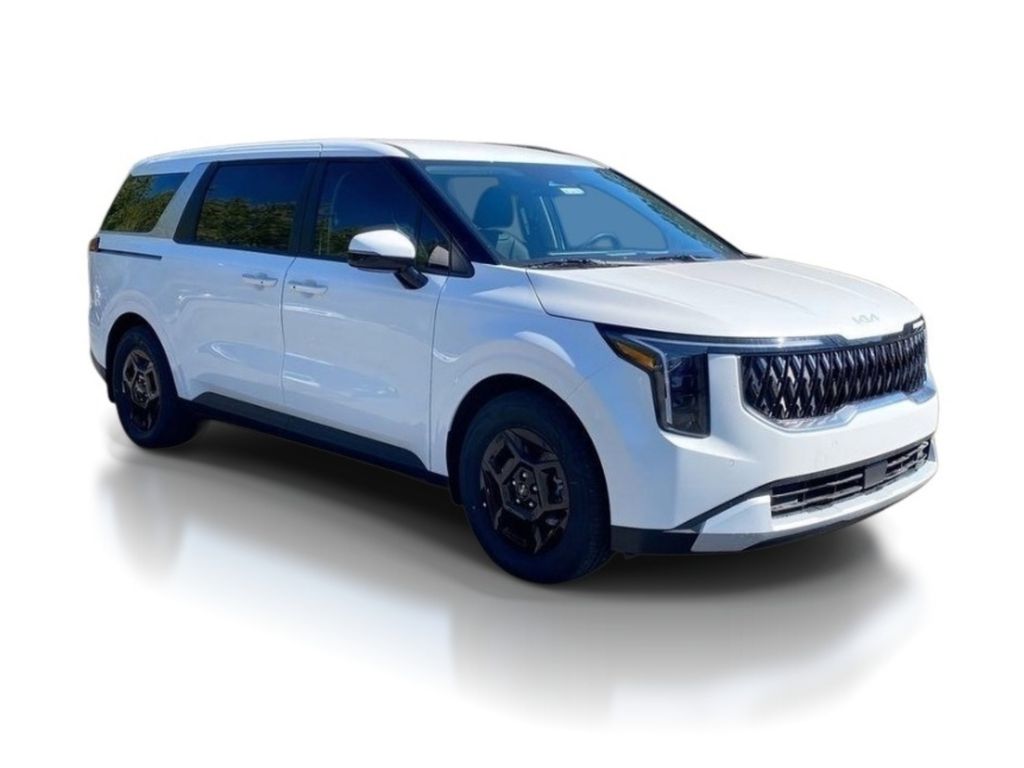2026 Kia Carnival LXS - Snow White Pearl exterior view 2