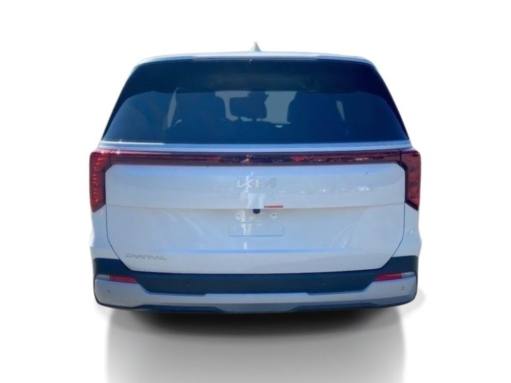 2026 Kia Carnival LXS - Snow White Pearl exterior view 6