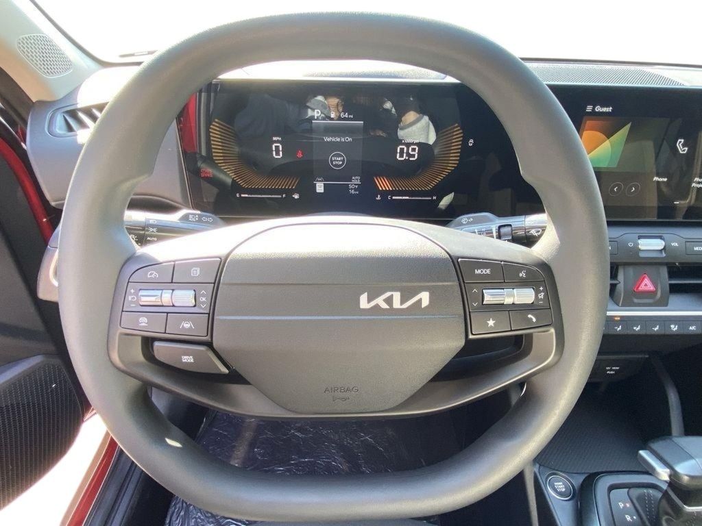 2026 Kia K4 LXS - Currant Red exterior view 9