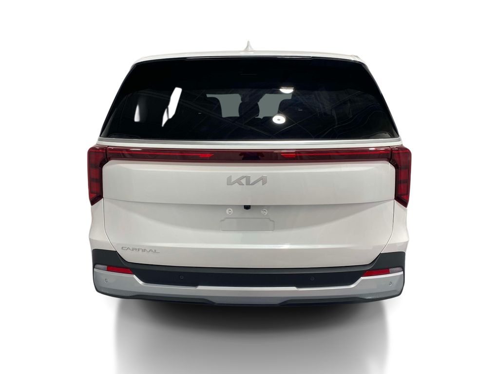 2026 Kia Carnival LXS - Snow White Pearl exterior view 3