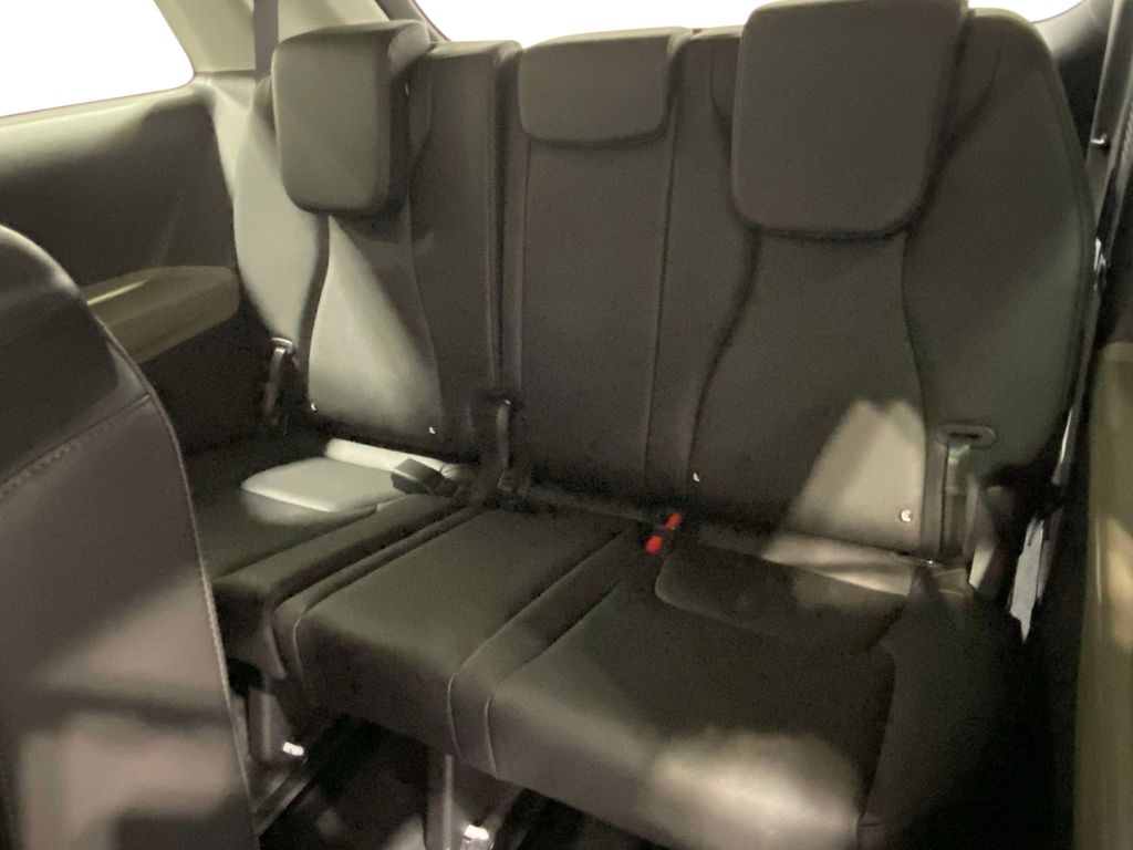 2026 Kia Carnival LXS - Snow White Pearl exterior view 13