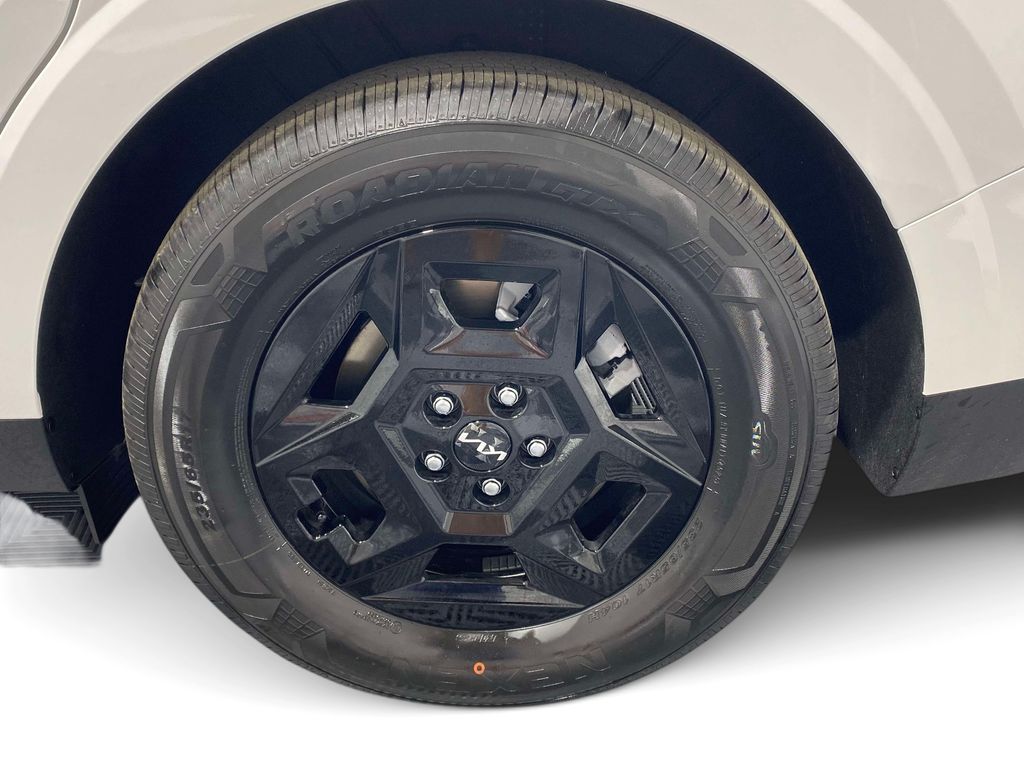 2026 Kia Carnival LXS - Snow White Pearl exterior view 7