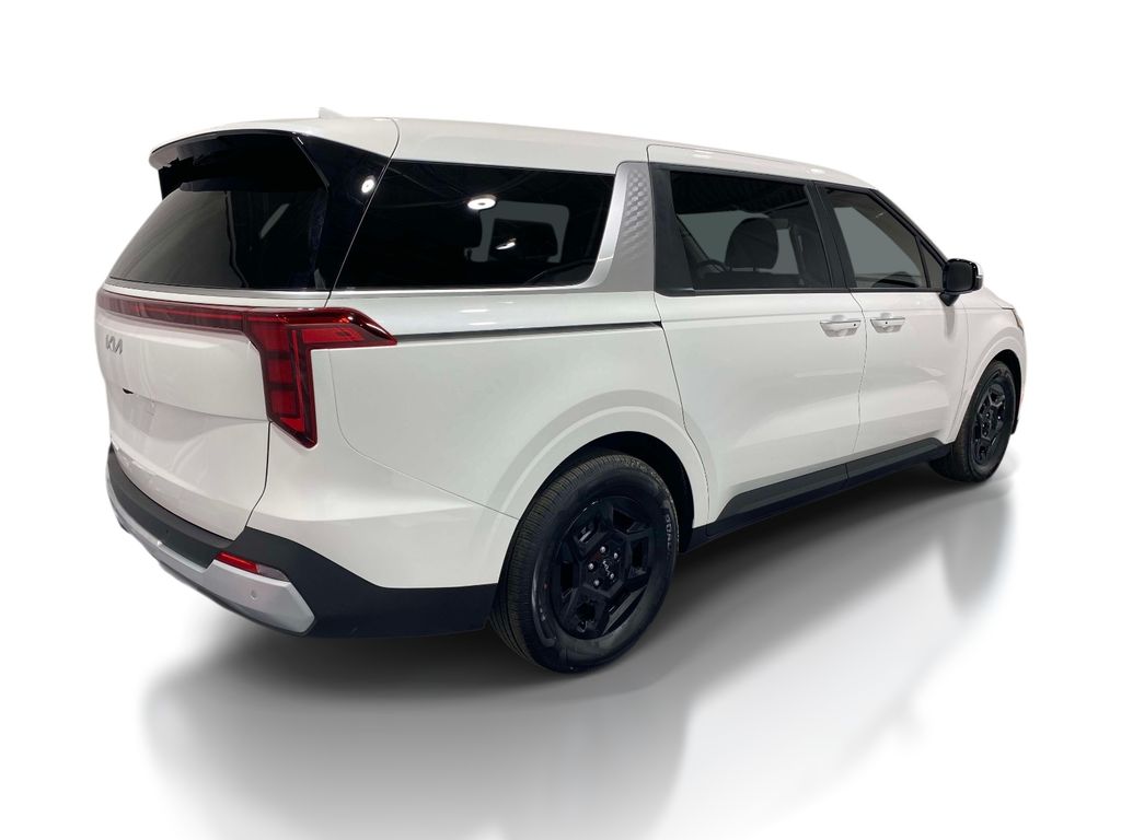 2026 Kia Carnival LXS - Snow White Pearl exterior view 4