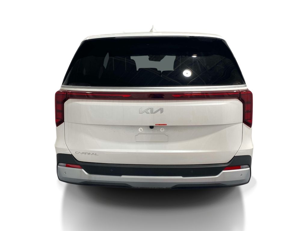 2026 Kia Carnival LXS - Snow White Pearl exterior view 3