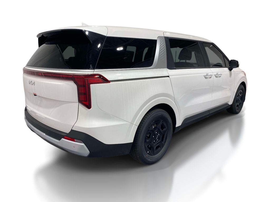 2026 Kia Carnival LXS - Snow White Pearl exterior view 4